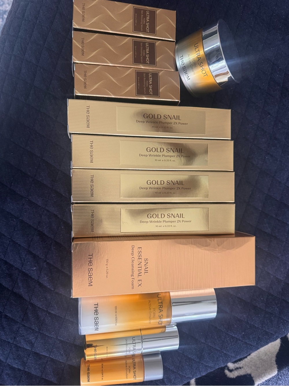 The saem mixed lot. Gold Snail & Ultra Shot Anti-Aging Skincare Set - Gold.